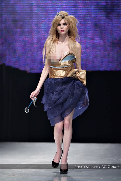 Fashion model suffers ultimate wardrobe malfunction on catwalk .